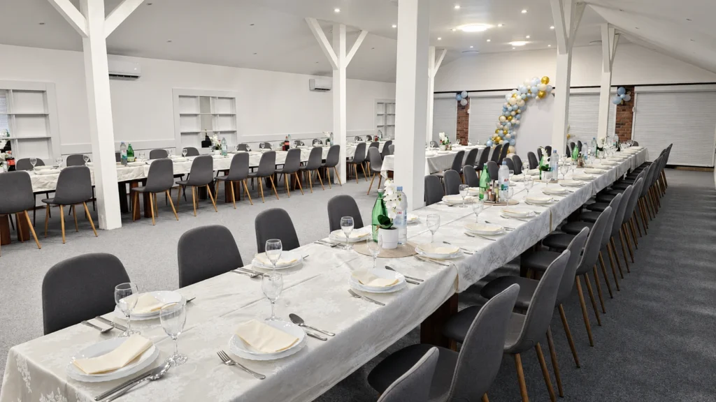 Moderno uređena sala za proslave u restoranu Baranjska priča s elegantno postavljenim stolovima za svečane događaje.