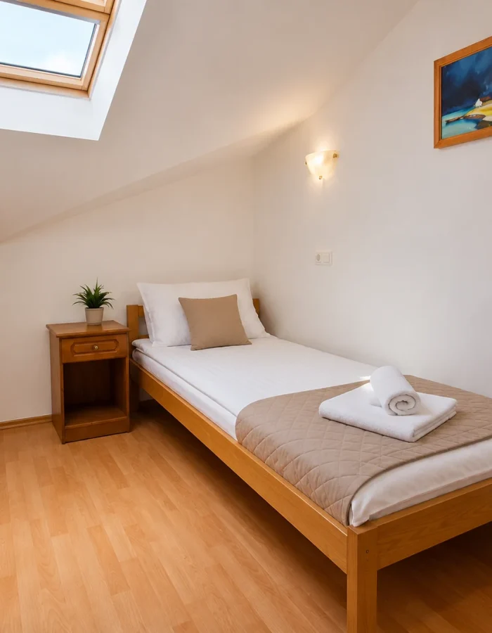 a_bright_tidy_minimalist_attic_loft_bedroom_inter